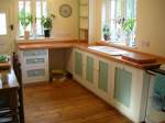 Painted kitchen made of tulip with ply carcasses.